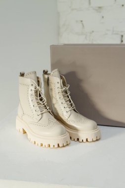 Women's leather boots in a branded box. NEW women's shoes