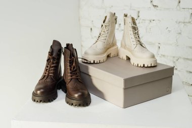 Women's leather boots in a branded box. NEW women's shoes