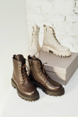 Women's leather boots in a branded box. NEW women's shoes