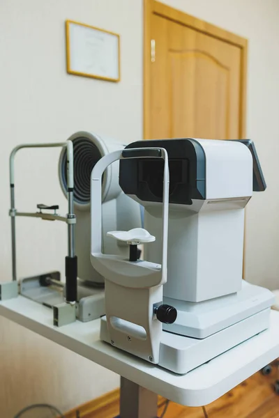 Modern apparatus for checking vision during ophthalmic treatment. Modern office of an ophthalmologist.