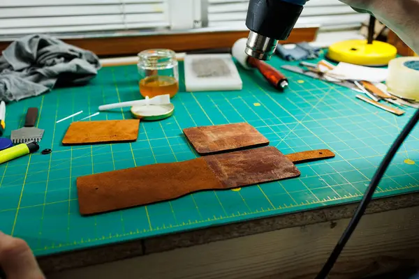 A work table for the manufacture of products from genuine leather. Tools for manual leather work