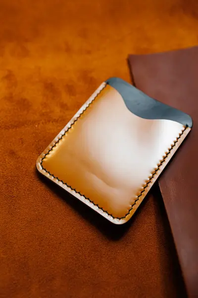 Handmade brown leather card holder. Handmade products made of genuine leather.