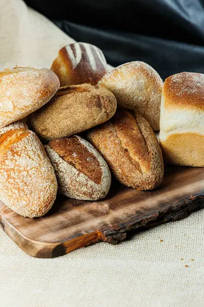 stock image Freshly baked rye bread on a mixture of whole grain, rye and wheat flour. Fresh homemade bread. Craft pastries