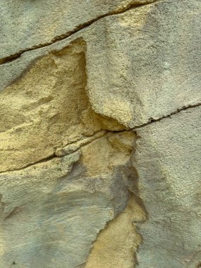 Karmaşık kaya yüzeyine daha yakından bakın. Eşsiz dokular ve çarpıcı altın desenler var. Bu desenler inanılmaz sanatsal ve yaratıcılık içeriyor.