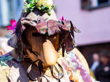 Shignano (Italy) 21/02/2023: The carnival of Schignano parade is one of the most famous traditional carnivals of north Italy with typical wood masks and performer that entertain the visitors .