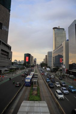 Indonesia, 18 february 2023 ; Modern office buildings in Jakarta, modern business skyscrapers, tall buildings, architecture soaring high into the sky. clipart