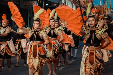 Yogyakarta, 27 may 2023; cultural parade in Kotagede with traditional jaranan clothes clipart