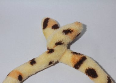 Çapraz oyuncak kuyrukları, kapatın