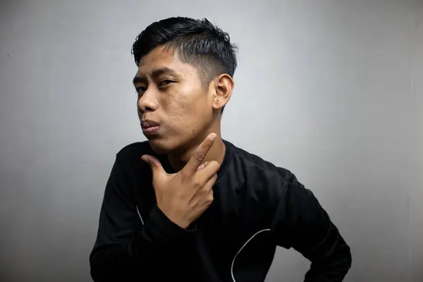 Pria Asia Emosional Berpakaian Hitam Berpose Latar Belakang Studio Putih Stok Gambar Bebas Royalti