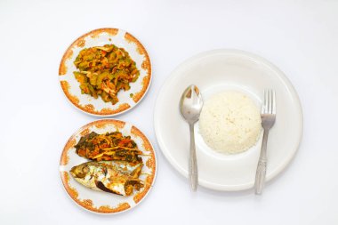 Balık buğulama ve Kızarmış Acı Kavun ve Beyaz Pirinç 