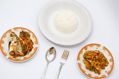 Balık buğulama ve Kızarmış Acı Kavun ve Beyaz Pirinç 