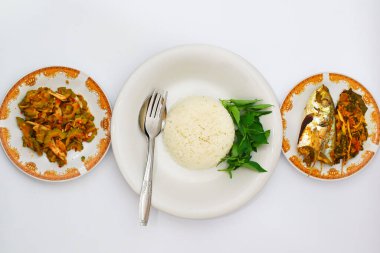 Balık buğulama ve Kızarmış Acı Kavun ve Beyaz Pirinç 