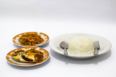 Balık buğulama ve Kızarmış Acı Kavun ve Beyaz Pirinç 