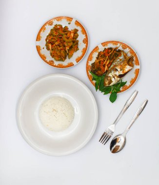 Balık buğulama ve Kızarmış Acı Kavun ve Beyaz Pirinç 