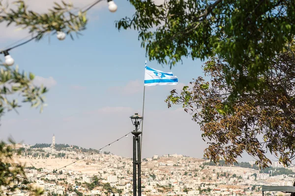 Israel Flag Over Old Jerusalem. Israels Independence Day: Israeli Flag Against Overlooks Most of Jerusalem and Offers a Beautiful View of the City.