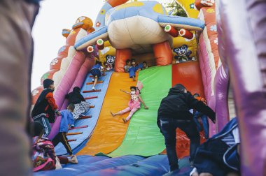 Chiang Mai, Thailand - January 14, 2023: Children's Day activities in Thailand in January of every year include snacks, food, dancing, and various rides.