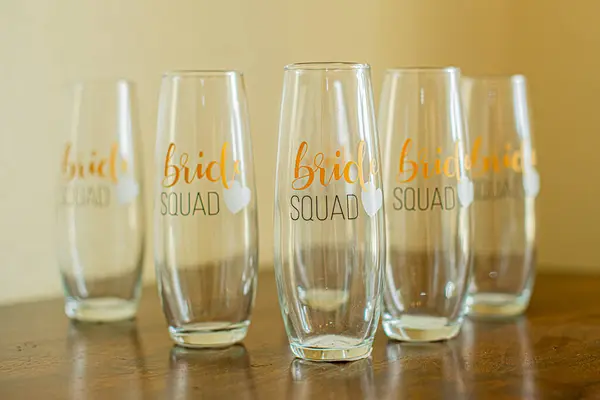 stock image Five bridal party class cups that read