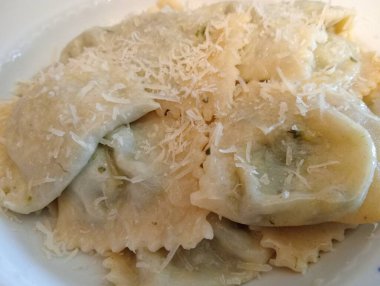 homemade pasta with cheese and tomato sauce