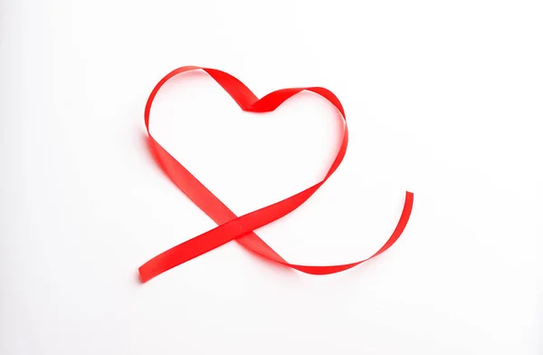 stock image Happy Valentines Day. Red Ribbon Heart on white background. Valentines Day concept