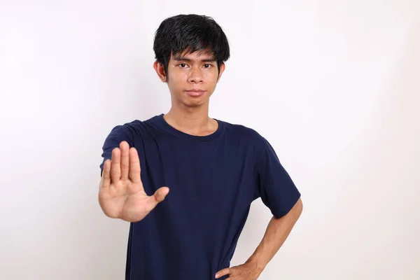 Portrait Asian Young Man Standing Stop Hand Gesture Terisolasi Pada — Stok Foto