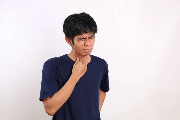 Aziatische Jongeman Heeft Keelpijn Raakt Zijn Nek Aan Tegen Een — Stockfoto