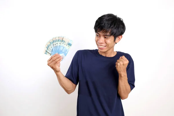 Happy Young Asian Man Shirt Standing While Holding Indonesian Banknotes — Stock Photo, Image