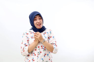Surprised asian muslim woman standing with excited face expression. Isolated on white background