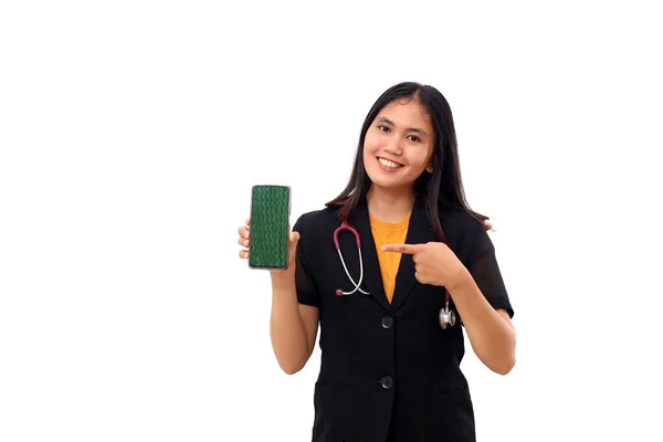 Happy Young Asian Doctor Pointing Blank Cell Phone Display Isolated — Stock Photo, Image