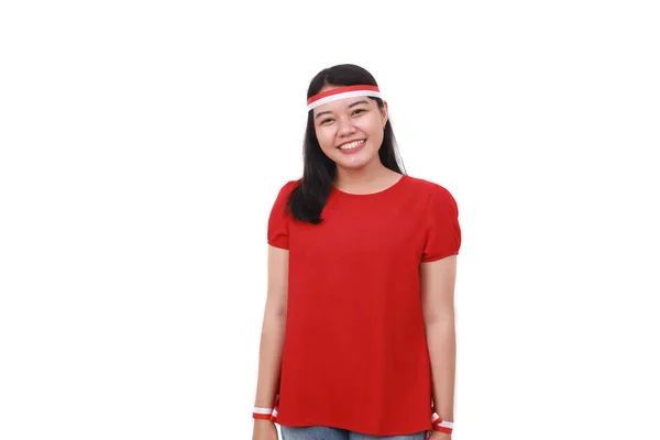 若いですインドネシアの女の子お祝いインドネシア独立記念日とともに赤白のヘッドバンド — ストック写真