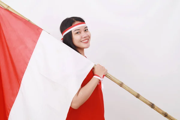 Jovem Indonésia Celebra Dia Independência Enquanto Segura Bandeira Branca Vermelha — Fotografia de Stock