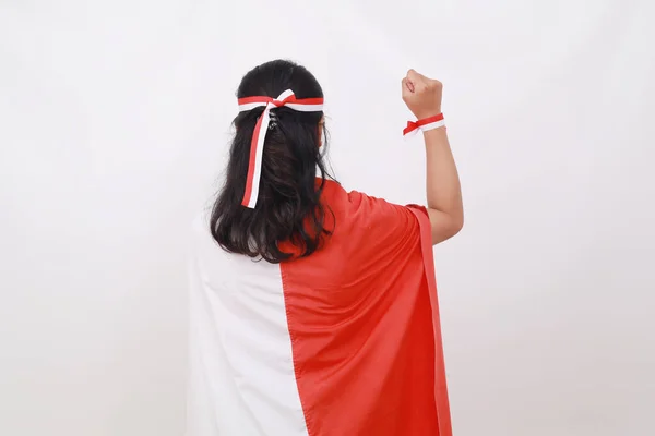 Vista Posterior Mujer Con Bandera Indonesia Con Mano Cerrada Aislado —  Fotos de Stock