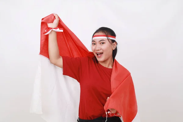 Alegre Joven Indonesia Celebrar Día Independencia Mientras Sostiene Bandera Roja —  Fotos de Stock
