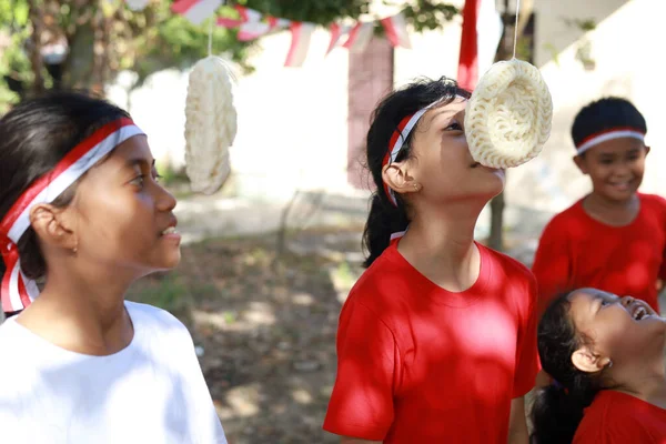 stock image Indonesian kids celebrate Indonesia independence day with outdoor contest