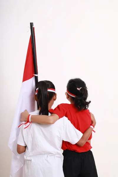 Дві Молоді Дівчата Святкують День Незалежності Індонезії Серпня Приміщенні Ізольовані — стокове фото