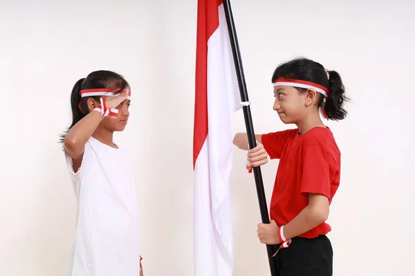 Дві Молоді Дівчата Святкують День Незалежності Індонезії Серпня Приміщенні Ізольовані — стокове фото