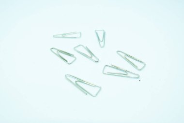A Collection of Paperclips on White Background