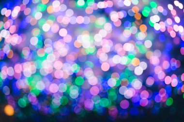 Soyut ampul bokeh arkaplan, kış ve noel aydınlatma kavramı