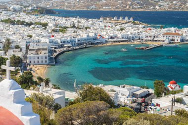 Looking across the Bay in Mykonos Town one of the Cyclades Islands in Greece clipart