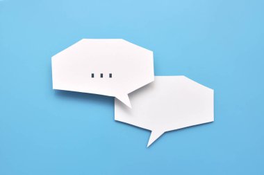 İki konuşma balonu. Yazma ihtiyacının bir sembolü, bir şeyi sorma ihtiyacı.