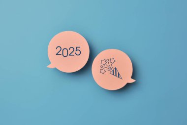 The inscription 2025 on the speech balloon and the fireworks next to it. The coming of the new year 2025 clipart