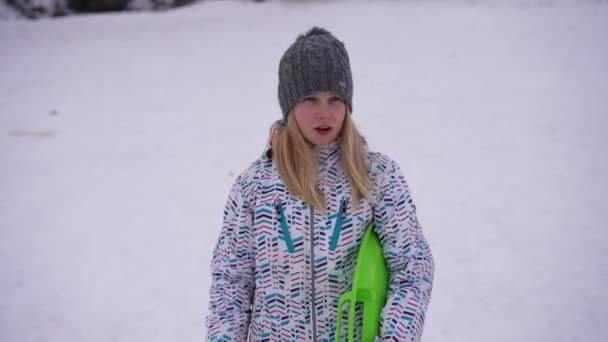 Relaxed Teen Girl Strolling Slow Motion Sled Looking Away Excited — Stockvideo