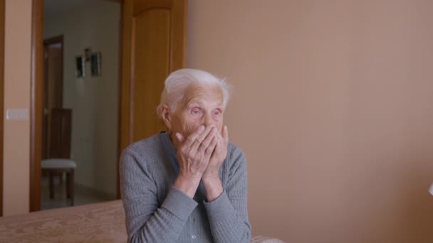Exhausted Old Tired Woman Rubbing Wrinkled Face Looking Away Sitting — Video Stock