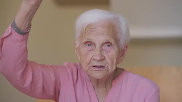 Positive Old Caucasian Grey Haired Woman Raising Hands One One — Wideo stockowe