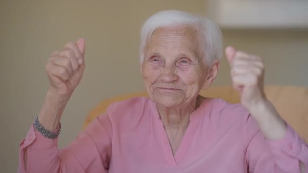Laughing Grey Haired Happy Old Woman Gesturing Success Looking Sitting — Vídeo de stock