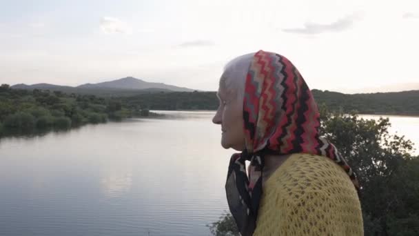 Side View Smiling Happy Old Woman Background Picturesque Landscape Mountains — Videoclip de stoc