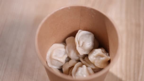Close High Angle View Paper Cup Boiled Cooked Dumplings Table — Stock Video