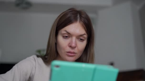 Close Portrait Tired Caucasian Young Woman Scrolling Digital Tablet Touchscreen — Stock Video
