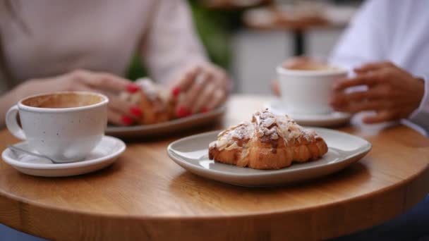 Close Coffee Cup Croissant Blurred Female Hands Background Unrecognizable Caucasian — Stock Video