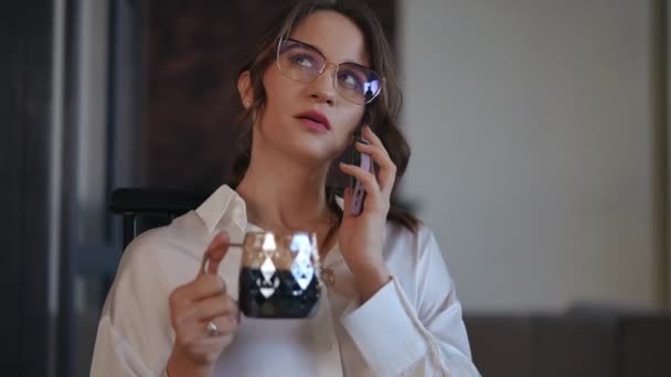 Woman Wearing Eyeglasses White Blouse Talking Enthusiastically Mobile Phone Glass — Stock Video
