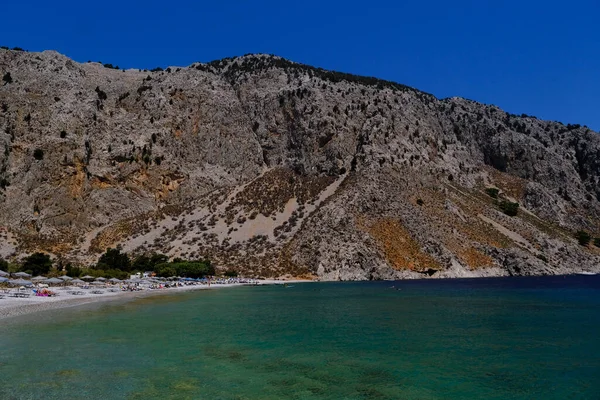 Gente Disfruta Del Sol Mar Playa Symi Dodecanese Grecia Agosto —  Fotos de Stock
